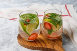 fresh-lime-strawberry-mint-infused-water-cocktail-detox-drink-lemonade-summer-drinks-health-care-concept